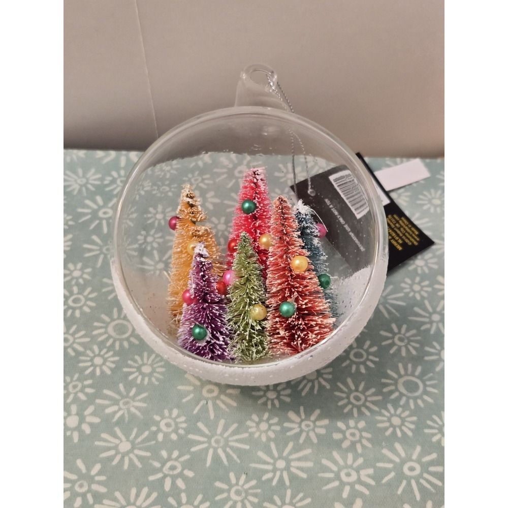 Glass Christmas Ornament with Colorful Sisel Trees Inside